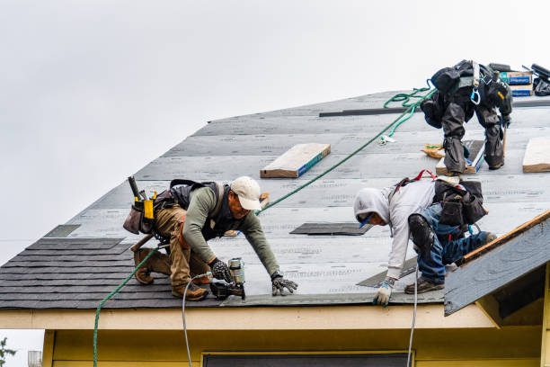 Professional Roofing technician working in La Quinta, CA